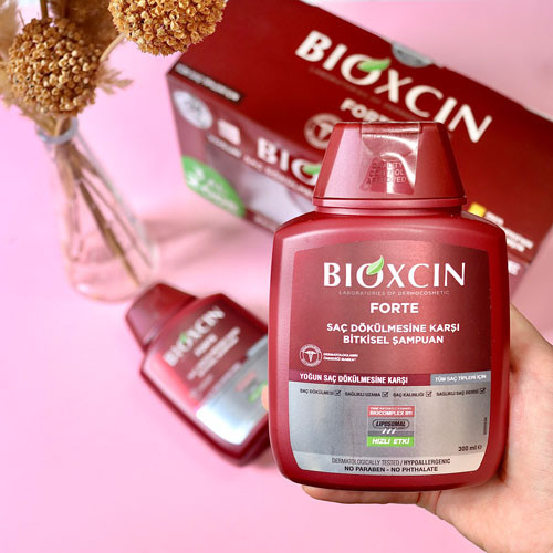 شامپو ضد ریزش و تقویت مو گیاهی بیوکسین BIOXCIN اصل مدل فورت قرمز حجم 300 میل مناسب انواع مو